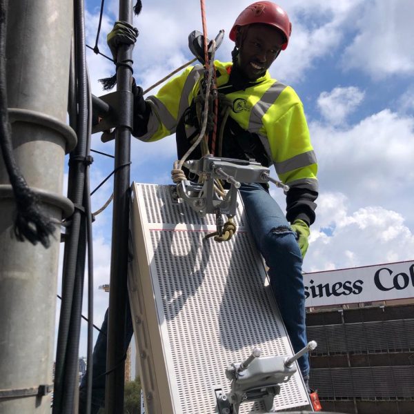 Satellite technician repairing equipment -360 Rope Access