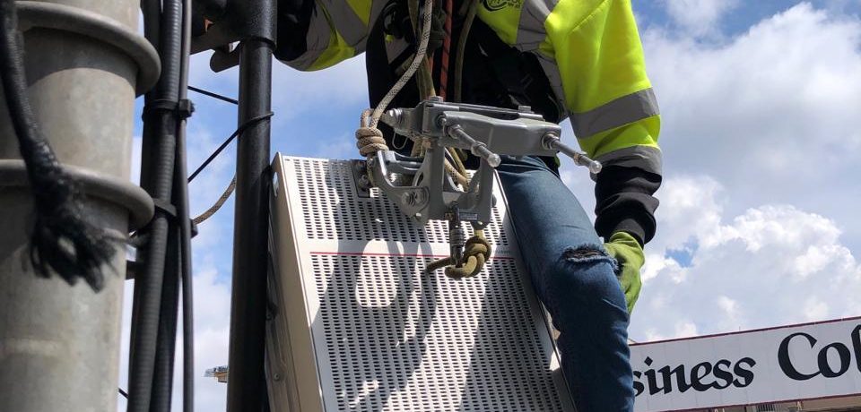 Satellite technician repairing equipment -360 Rope Access
