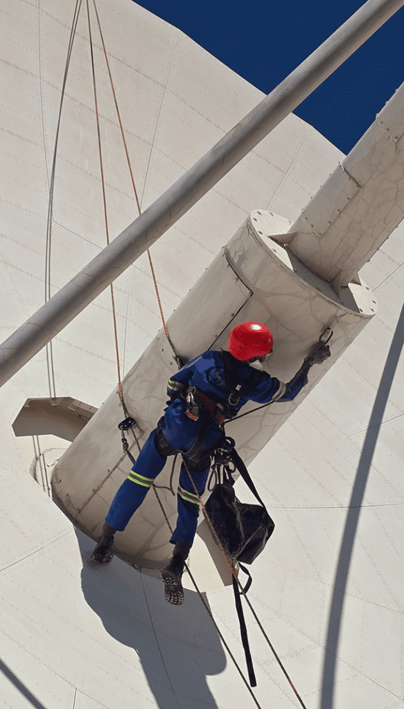 Satellite PPM Maintenance Hartebeespoort rope access worker completing maintenance and painting at height