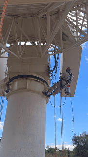 Satellite PPM Maintenance Hartebeespoort rope access technician treating rust on satellite infrastructure