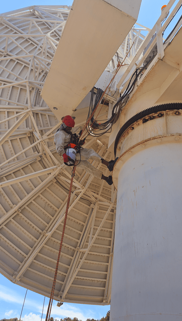 Satellite PPM Maintenance Hartebeespoort technician performing rust maintenance on satellite structure