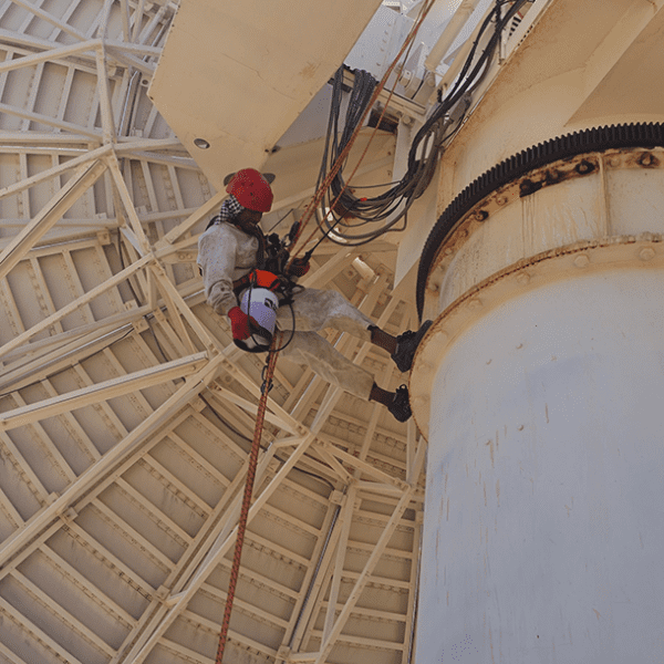 Satellite PPM Maintenance Hartebeespoort technician performing rust maintenance on satellite structure