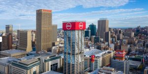 Rope Access Signage Repair Johannesburg drone view showing ABSA Tower above the Johannesburg CBD skyline