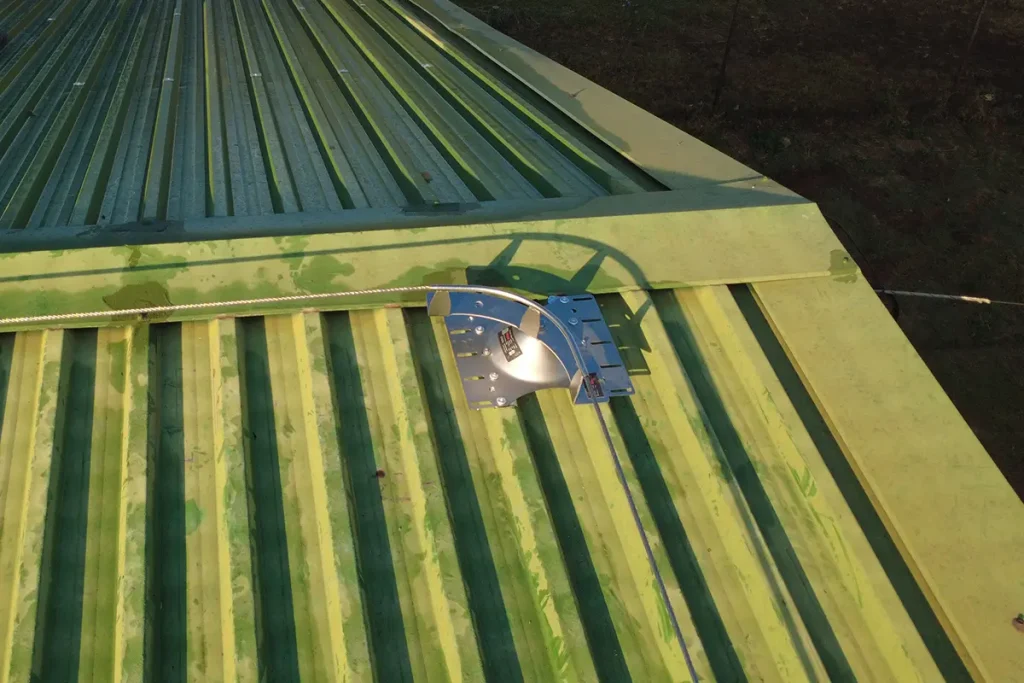 lifeline installation South Africa with base plate and cable connection on metal roof