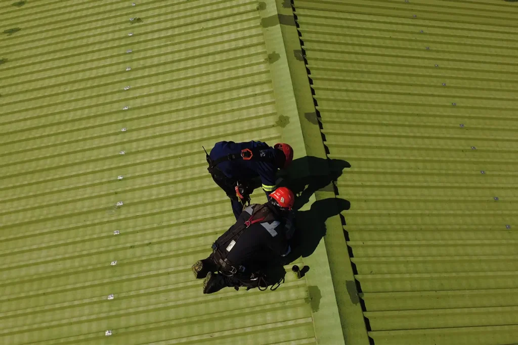 metal roof lifeline installation work near ridge fixing positions on metal roof