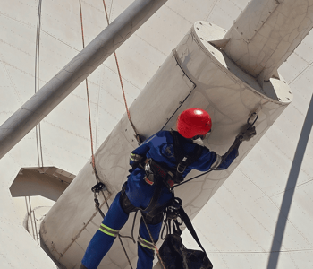 Satellite PPM Maintenance Hartebeespoort rope access worker completing maintenance and painting at height