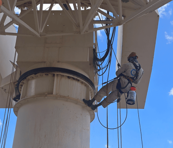 Satellite PPM Maintenance Hartebeespoort rope access technician treating rust on satellite infrastructure