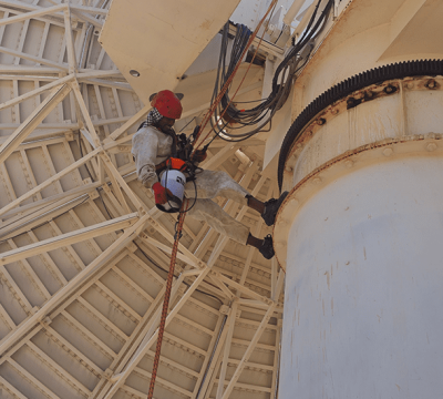 Satellite PPM Maintenance Hartebeespoort technician performing rust maintenance on satellite structure