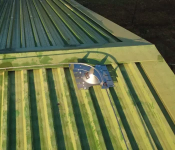 lifeline installation South Africa with base plate and cable connection on metal roof