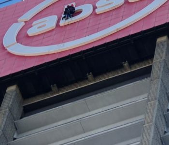 Rope Access Signage Repair Johannesburg with technicians working on the ABSA Tower sign at height